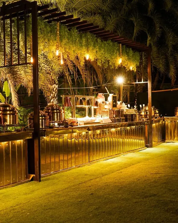 A breathtaking view of one of our luxury buffet setups, draped entirely in gold. This is how we transform a venue into a grand dining experience, ensuring the presentation is as memorable as the food for your wedding or special event.