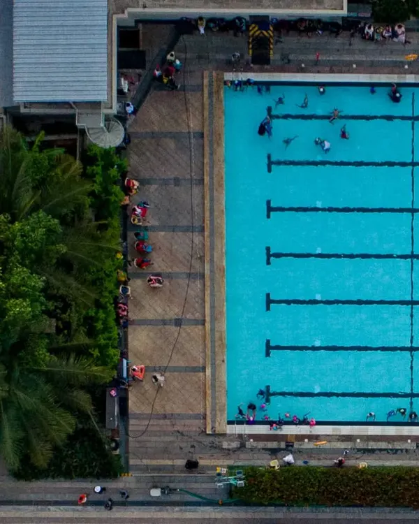 An aerial view of our swimming centre reveals the impressive scale and design of our pools. These shots showcase our clean, organized, and spacious environment, perfect for both training and leisure.