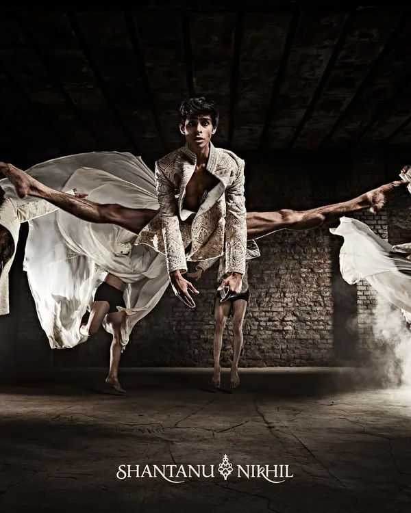 A stunning moment of dynamic balance from the Shantanu & Nikhil campaign. My choreography aimed to create shapes that were as architectural and detailed as the garments themselves, using the dancers' bodies to extend the lines of the fashion.