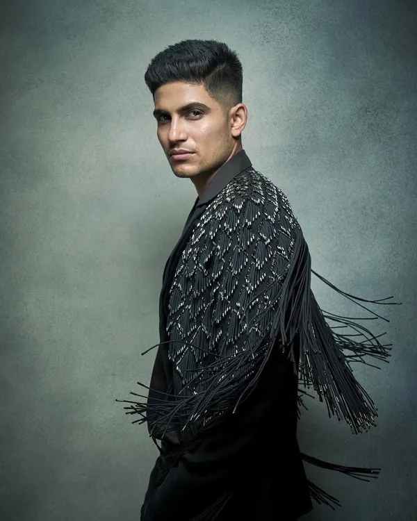 Styling Shubman Gill in this statement jacket with detailed fringe work. It’s a piece that adds movement and a bold texture, perfect for making an entrance.
