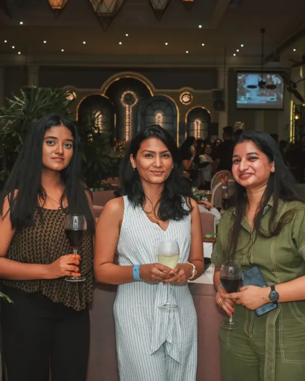 Guests at a corporate event enjoying a relaxed evening. My mansion provides a sophisticated yet comfortable setting that encourages networking and genuine interaction outside the office.