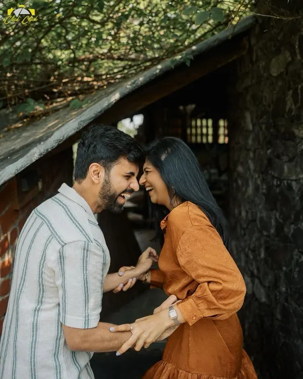 A moment of shared laughter in a rustic, earthy setting. This is the kind of natural, unforced joy I love to capture in my pre-wedding couple portraits.