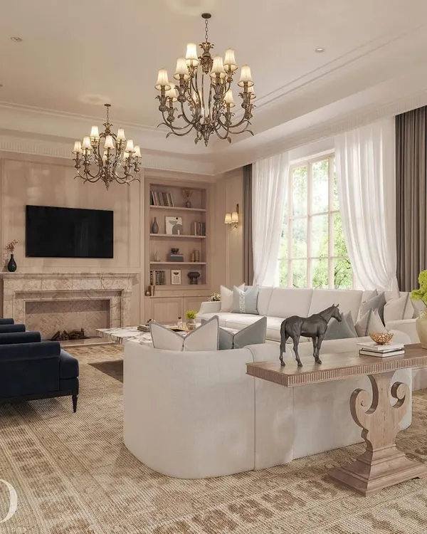 This living room blends timeless classical aesthetics with subtle contemporary comfort. The space feels warm and luxurious, with beautifully paneled walls, a stately marble fireplace, and soft neutral furnishings balanced by deep navy accents.