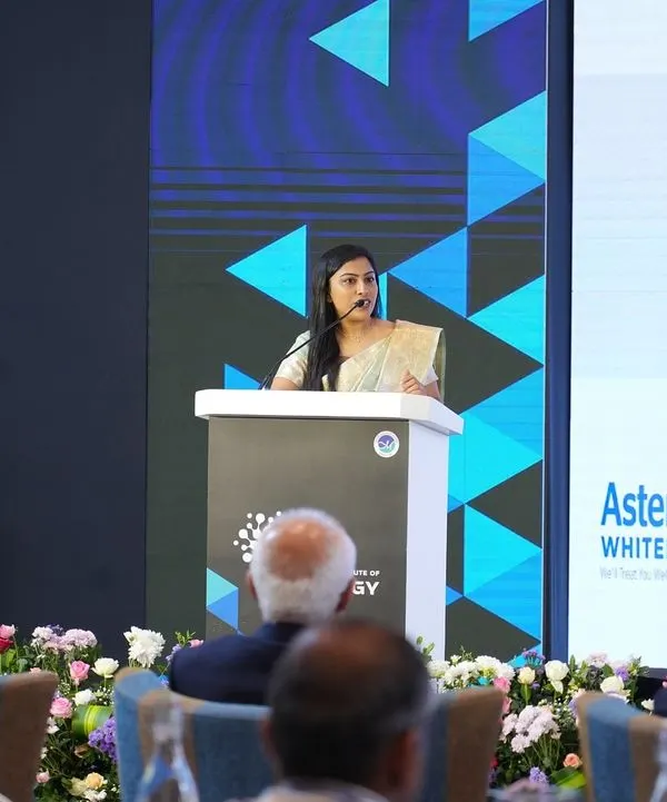 Addressing the audience at a corporate healthcare event. I am experienced in hosting for specialized industries, ensuring the right tone and terminology are used.