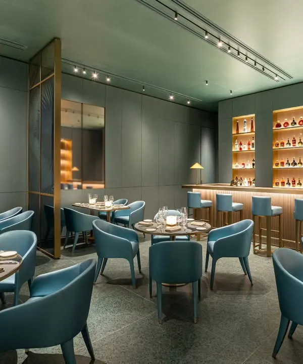 This wide shot of the Armani Caffe in Mumbai showcases my approach to luxury interior photography. I focused on the moody, sophisticated ambiance, balancing the warm, backlit bar with the cool tones of the custom blue seating to create an image that feels both exclusive and inviting.