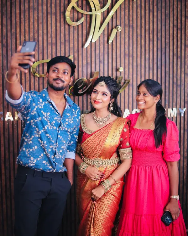 A happy selfie moment with a model and makeup artist after a successful shoot. Teamwork makes the dream work.