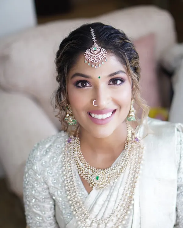 (Hero Media) This is the essence of my work: creating a timeless look that lets your natural radiance shine through. For Reshma's engagement, we focused on a soft, glowing complexion and sparkling eyes to complement her stunning smile and elegant attire. I believe makeup should celebrate you.