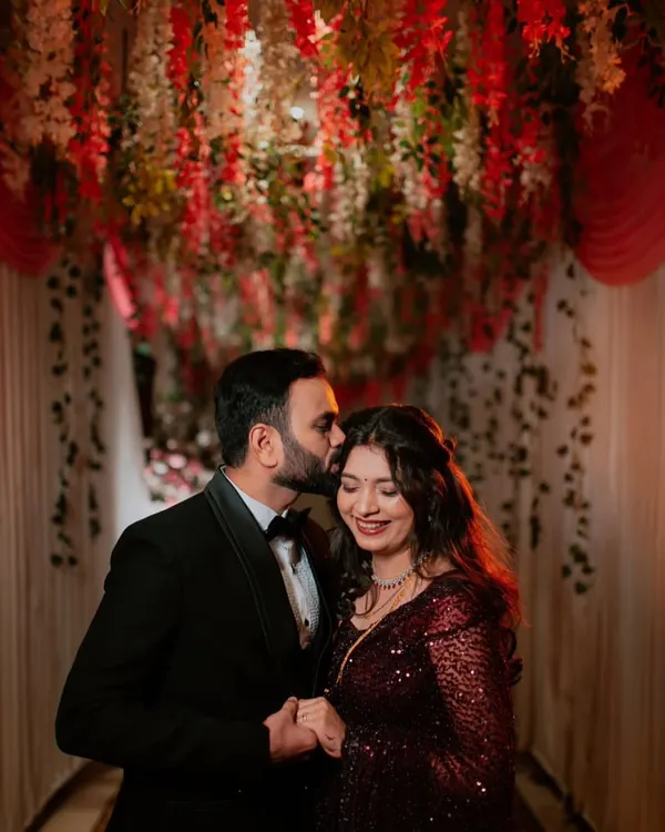 This is the moment I love creating: a perfectly glamorous bride and her happy groom. For Ankita's engagement, I focused on a timeless look with soft, glowing skin and a classic red lip that complemented her stunning sequin saree.