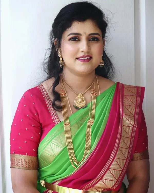 Mrs. Shreegowri looking elegant for an engagement ceremony. I gave her a soft party makeup look with gentle waves in her hair, perfect for a family celebration.