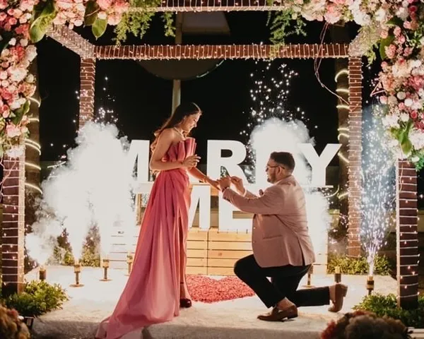 The perfect moment. We created this romantic setup with a rustic brick-textured arch, soft florals, and dramatic cold pyros to make this surprise proposal an absolutely unforgettable memory.