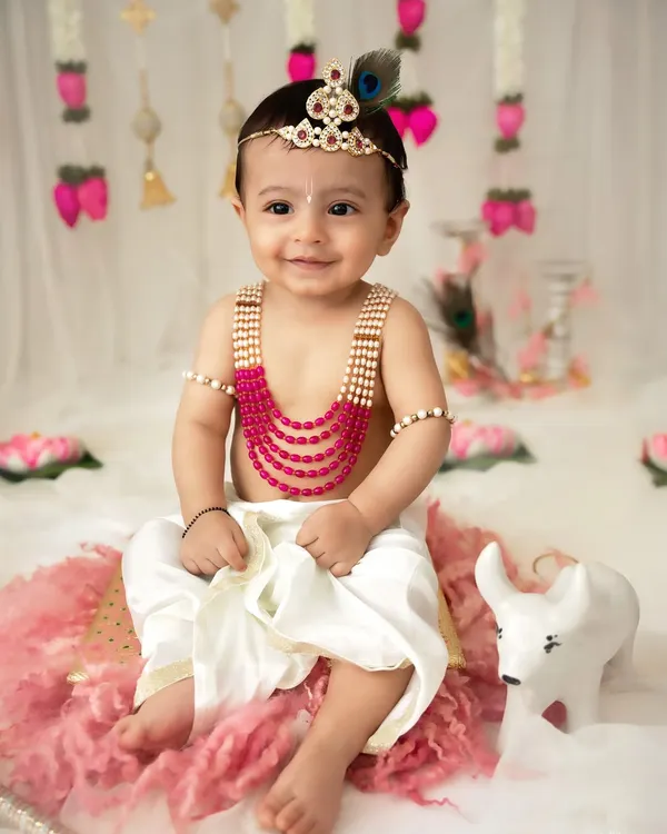 A sweet smile from a little Krishna. My Janmashtami mini-sessions are designed to be fun for the little ones, resulting in adorable and festive portraits.