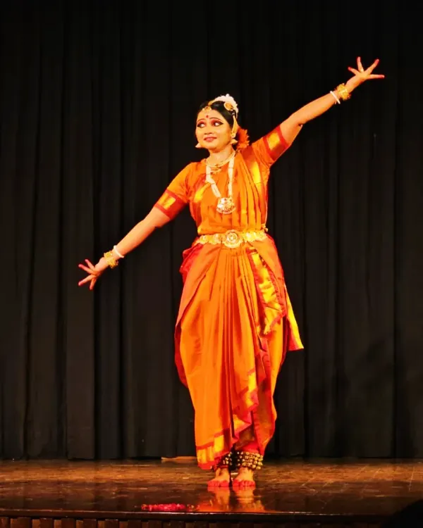 My disciple, Sudipta Chakraborty, a fellow Kalakshetra alumna, captured in a moment of pure grace during her performance at the India International Centre. Her dedication to the art form shines through in every movement.