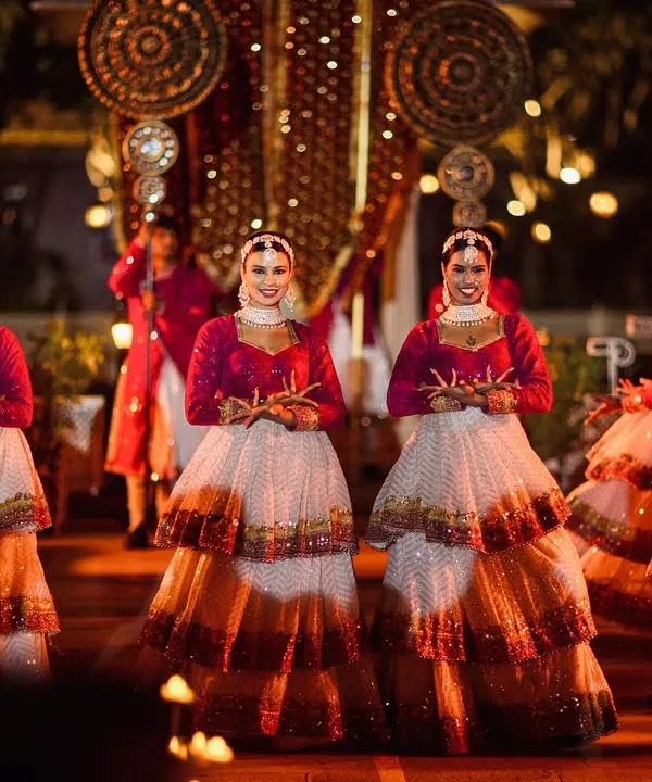 A beautifully choreographed welcome for the groom, with dancers in traditional attire creating a royal and festive atmosphere for his Sangeet entry.