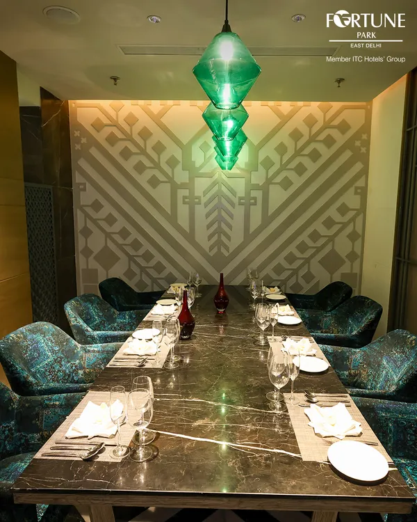 My Private Dining Room at Zodiac offers an exclusive and stylish setting for your intimate gatherings. The rich textures of the chairs and the modern art-deco-inspired decor create a sophisticated backdrop for a memorable meal.