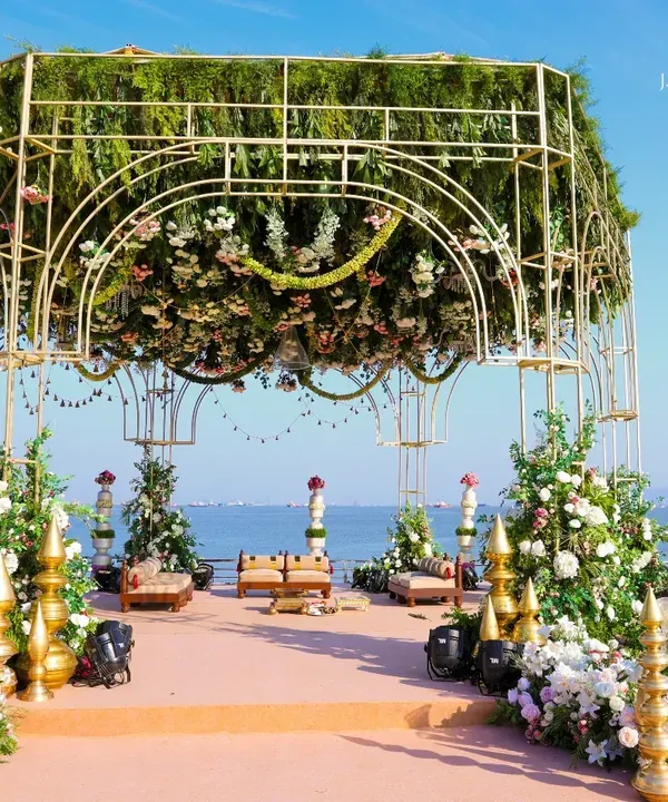 This is where vows feel as infinite as the ocean. I designed this breathtaking seaside mandap to merge the grandeur of a floral canopy with the serene beauty of the coast, creating a truly unforgettable ceremony backdrop.