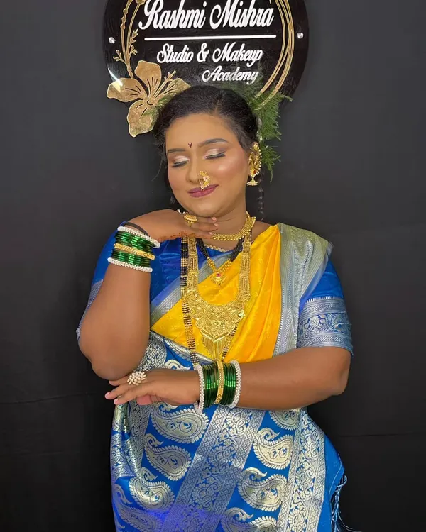 A stunning makeup demonstration on a dusky skin model. This look celebrates her deep skin tone with a golden glow, shimmering eyes, and a perfectly matched base.