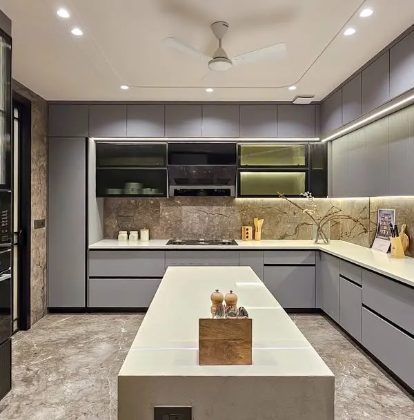 Step into the heart of the home with my latest kitchen design. I used sleek grey cabinetry, a marble-look backsplash, and warm under-cabinet lighting to create a space that is both sophisticated and highly functional.