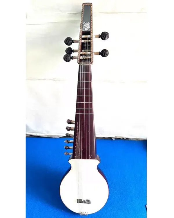 This is a Rabab, a lute-like instrument central to the music of Afghanistan, Pakistan, and parts of India. We source authentic Rababs for musicians seeking its distinctive, soulful sound.
