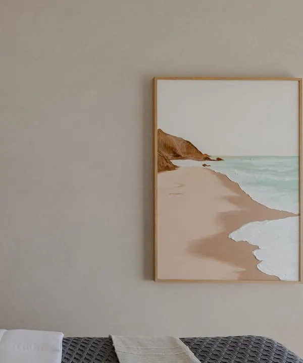 This serene, minimalist beachscape was installed in a Mumbai bedroom, creating a peaceful and calming atmosphere. The textured waves add a subtle 3D element to the painting.