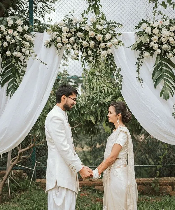 We provide a beautiful setting for intimate wedding ceremonies, like this one with a simple yet elegant floral arch.