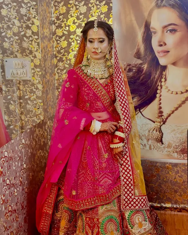 A full-length view of one of my stunning brides. I provided the complete package, including the HD bridal makeup, the elaborate hair updo, and jewellery setting.