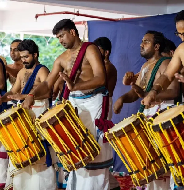 Our ensemble performing a lively Melam for an Onam program in Kanakapura, bringing festive energy to the celebration.
