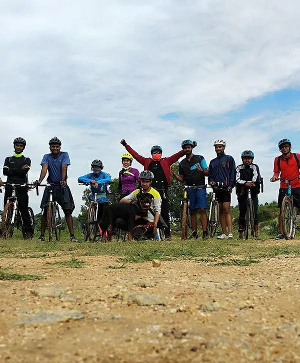 This is us. A big, happy crew, a mix of bikes, and an open trail ahead. It doesn't matter if you're a pro or just starting, as long as you're here for the adventure.