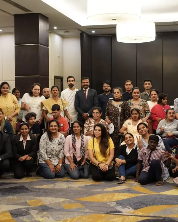It was our honor to host a heartwarming lunch for the children from the Spastic Society of Karnataka. This group photo captures the joy and connection shared during this special day.
