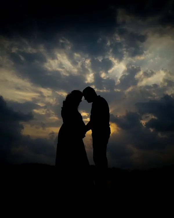 There is nothing more beautiful than a sunset sky. I love creating these silhouette portraits for couples during outdoor maternity sessions, capturing their connection in a dramatic and natural setting.