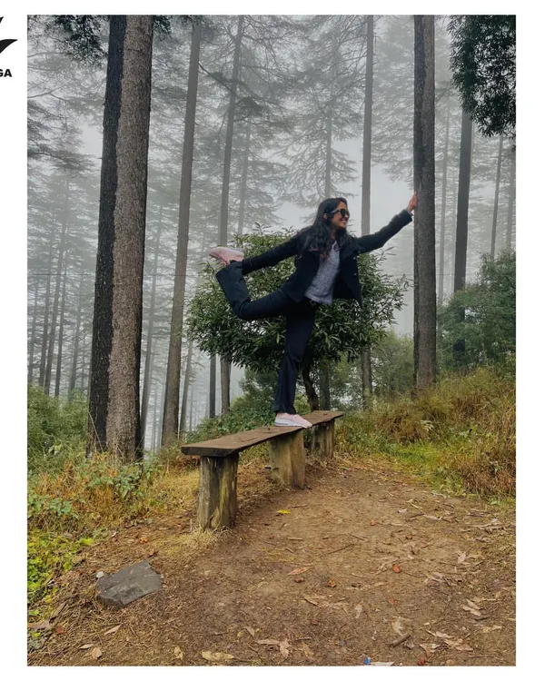 Practicing Natarajasana, the dancer's pose, in the middle of a forest. The natural, uneven surface adds an extra challenge to my balance and helps me feel grounded.