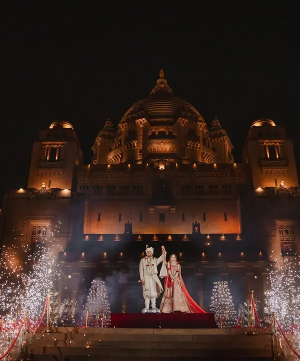 This is the moment that takes everyone's breath away. I help you create a fairytale entrance against a majestic backdrop like the Umaid Bhavan Palace, complete with fireworks that light up the sky and mark the beginning of your forever.