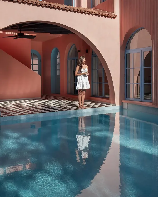 The central courtyard and pool at Baia Villas is the heart of the project. I designed this U-shaped layout to seamlessly connect the living spaces to this focal point, creating an indoor-outdoor experience that is quintessentially Goan.