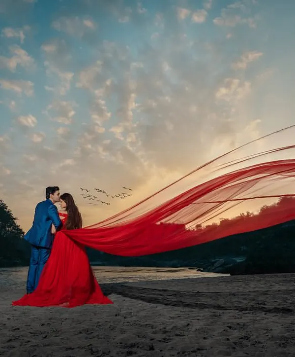 This is the shot that gives me goosebumps. A splash of red against the grand canvas of Rishikesh at sunset. It’s not just a photo; it’s that full filmi feeling, where for a moment, you are the hero and heroine of your own epic love story.