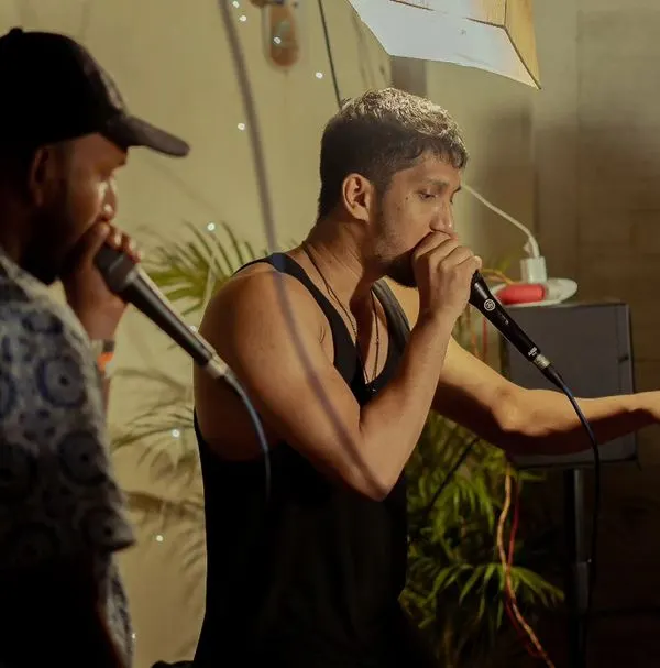 Going back and forth with another beatboxer during a live set. These vocal percussion duels are all about listening and reacting, which is a key skill we practice in my workshops.