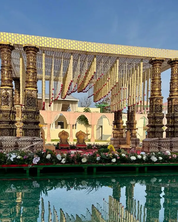 This floating mandap is one of our signature designs, offering a spectacular and serene setting for your vows, with its reflection shimmering on the water below.