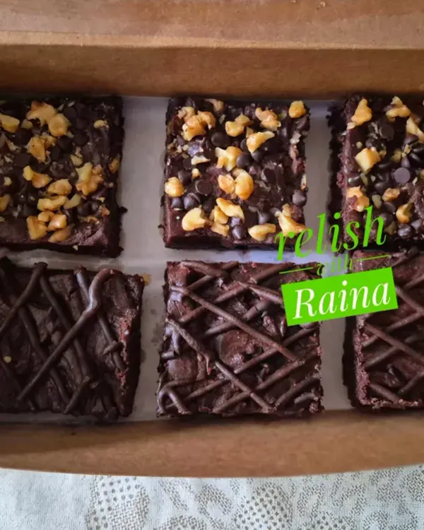 A box of my assorted eggless Ragi Brownies. This one includes Choco-walnut, Double Chocolate, and Nutella drizzle flavours, all made with healthy ragi flour.