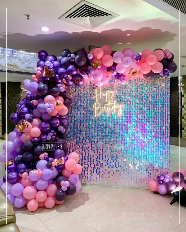 This Rapunzel-themed birthday for Shanvi was a fairytale come true. We combined a shimmering sequin wall with a lush organic balloon garland in shades of purple and pink to bring the magic of the story to life. It’s setups like these, full of wonder, that we absolutely love creating.