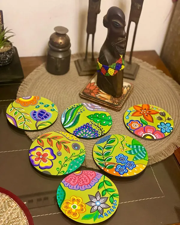 This set of six funky and fun coasters was a custom order for a wonderful client. Each coaster has a unique, vibrant floral design, making them functional pieces of art for your table.