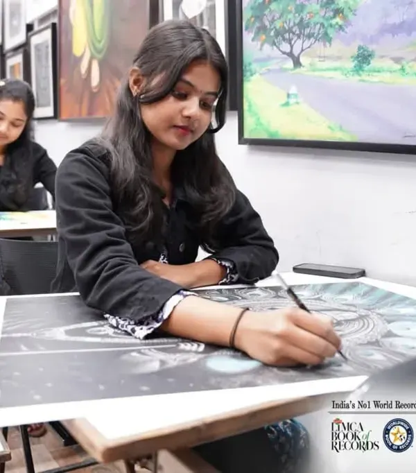 At Kalabhumi, we believe in learning by doing. Here, a student in our Diploma in Fine Arts program is deeply focused on her charcoal and graphite project, mastering the intricate details of light and shadow.