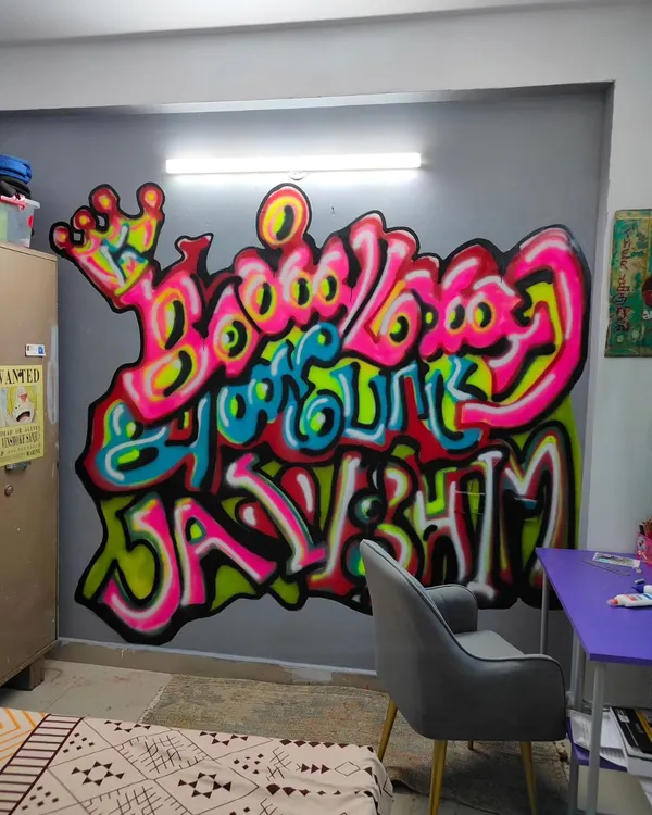 This is the hero piece for my daughter's bedroom, a bold graffiti mural that reads "Kanmani Anbodu Jai Bhim" (With love, my precious, Victory to Bhim). It combines my love for Tamil script, vibrant spray paint art, and our family's belief in Dr. Ambedkar's ideals. This is how I transform a personal space into a powerful statement wall.