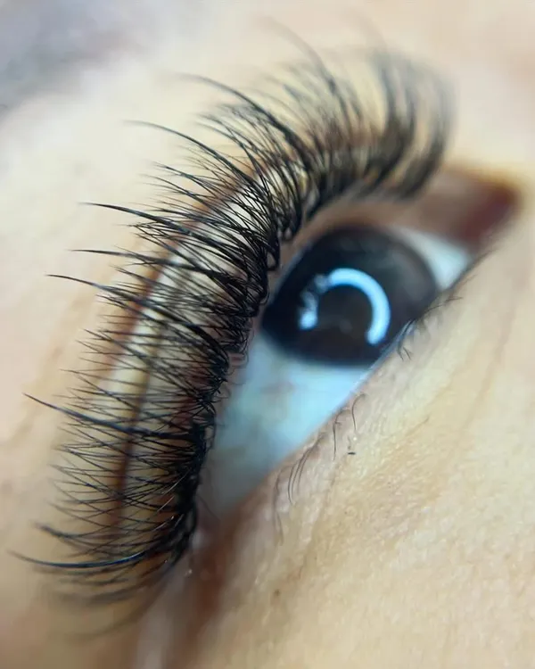 This detailed macro shot highlights the precision of my lash application. Each extension is placed one by one to ensure a seamless blend with your natural lashes for a flawless, high-definition finish.