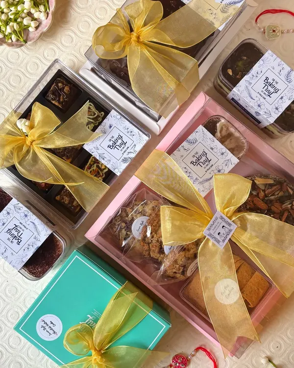 This is what pure joy in a box looks like. I pour my heart into curating these hampers with a variety of my best eggless treats, all beautifully packaged with premium boxes and ribbons, ready to make someone's day.