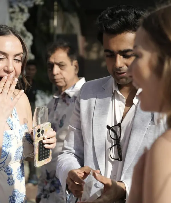 The moment of revelation. A guest at a beautiful wedding in Indore reacts with pure shock as the magic unfolds right before her eyes.