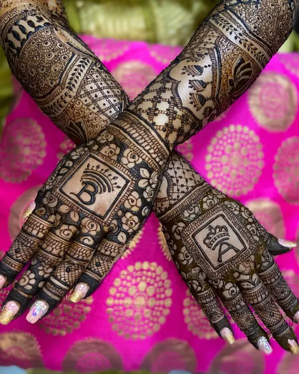 A stylish way to showcase your partnership. This design features the couple's initials, 'A' and 'B', in bold, modern fonts, each topped with a crown.