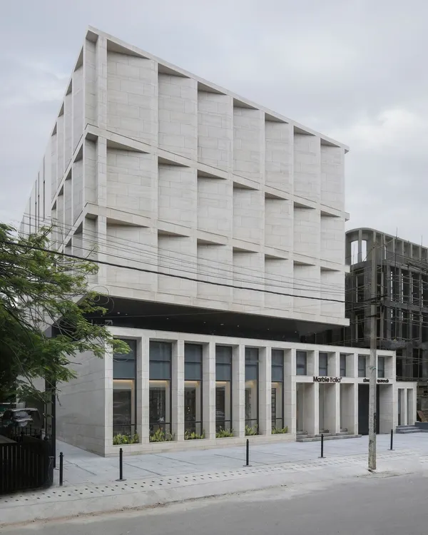 The completed Stone Boulevard building stands as a testament to precise execution, perfectly matching its initial 3D render. This alignment of vision and reality is achieved through meticulous planning and collaboration across all teams.