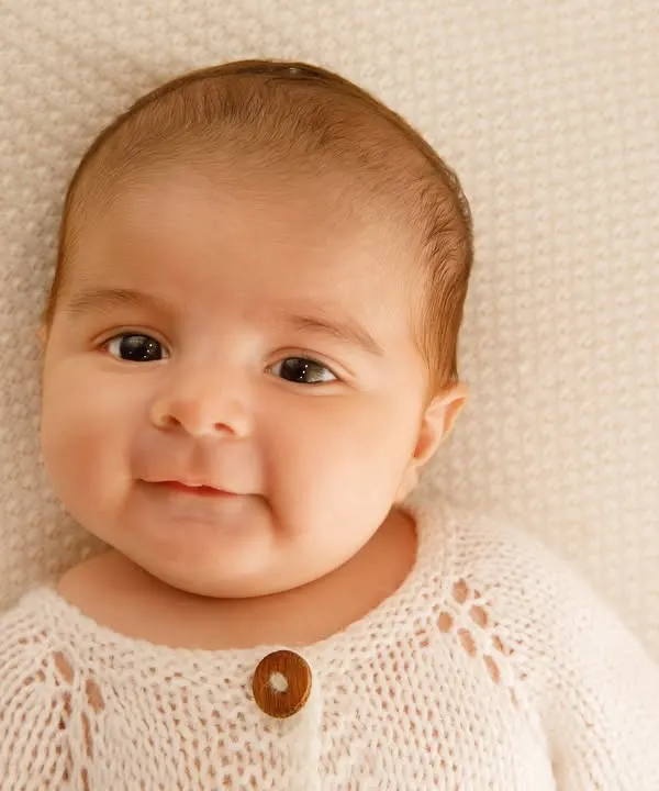 That first, heart-melting smile. There is nothing in the world more pure than a newborn's happy face, and I feel so lucky to capture it.
