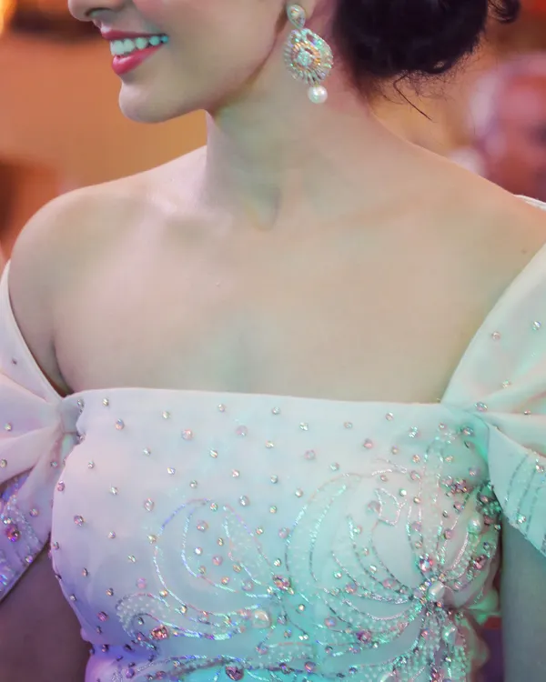 This is a detailed view of the hand-beaded bodice on the light pink engagement gown. I used a mix of pearls and sequins to create a subtle shimmer that catches the light beautifully.