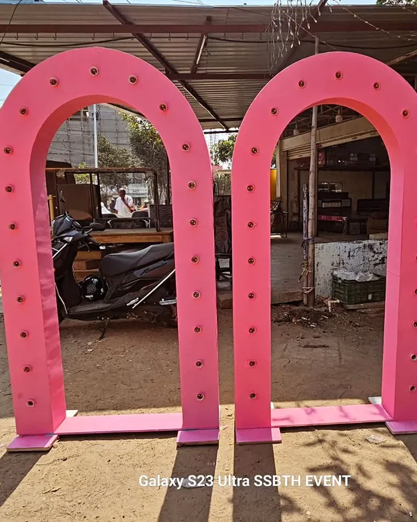 These large, pink light-up arches are available for rent. They make a fantastic entrance for birthdays, baby showers, or any event where you want to make a grand first impression.