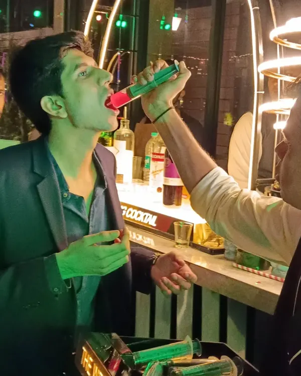 My team serves syringe shots directly to guests, making it an interactive and fun experience that gets everyone involved in the party.