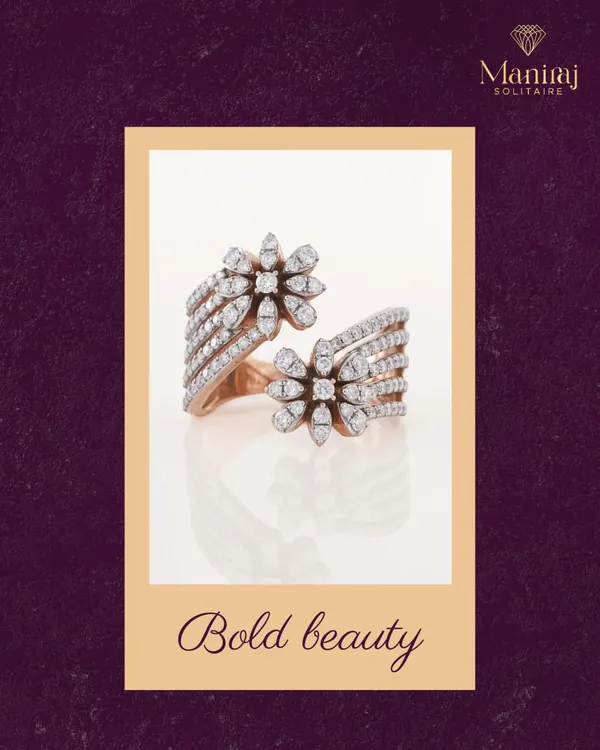 Small in size, but big on style. This bold diamond ring features a unique open design with two floral clusters. It's a piece that makes a statement in a subtle, sophisticated way.